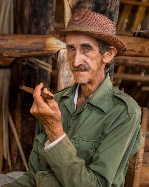 Cuban Tobacco Farmer Enjoys a Cigar